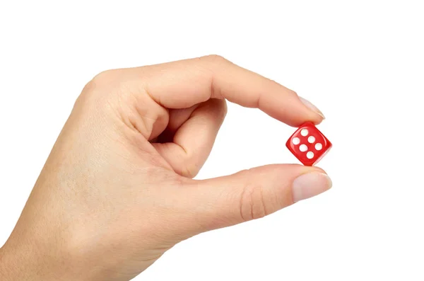 Red plastic dice in hand, isolated on white background. Leisure fun time — Stock Photo, Image