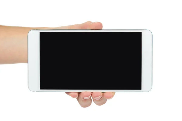 White mobile phone with dark screen in hand, isolated on white background. Advertise template, copy space — Stock Photo, Image