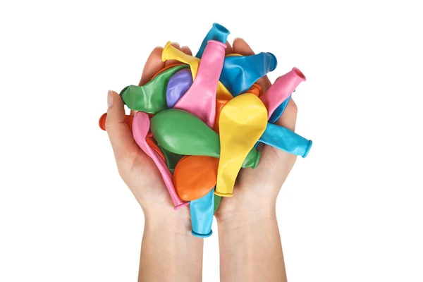 Gumové vzduchu balóny pro celebreting, colorfull party dekorace v ruce. Izolované na bílém pozadí — Stock fotografie