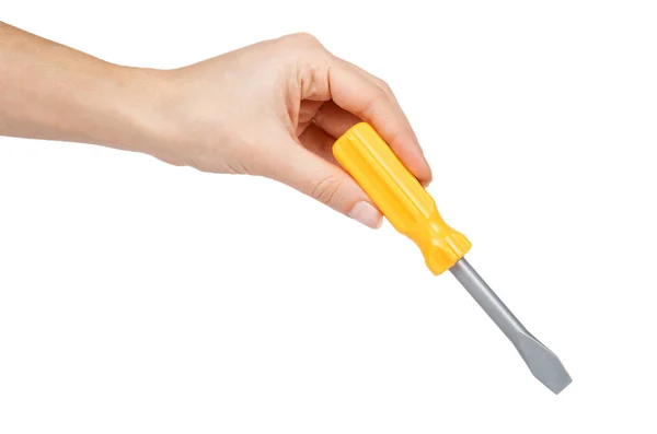 Yellow plastic toy screwdriver, kid workshop game tool in hand. Isolated on white background — Stock Photo, Image