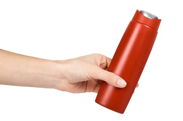 Gel doccia in bottiglia di plastica rossa in mano. Isolato su uno sfondo bianco. Crema per la cura del corpo, sapone igienico. Modello vuoto — Foto Stock