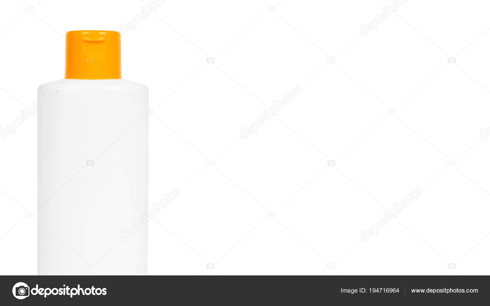 Plastic White Shampoo Bottle With Orange Cap Isolated On White