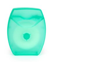 Diş ipi beyaz arka plan üzerinde izole. Hydiene ve sağlık fikir. kopyalama alanı şablonu