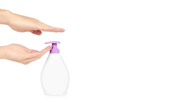 Distributeur de savon désinfectant pour les mains blanc isolé à la main sur fond blanc. Travaux ménagers et sanitaires concept. espace de copie, modèle — Photo
