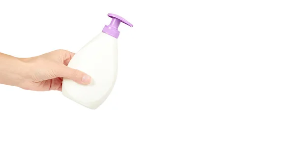White hand sanitizer soap dispenser in hand isolated on white background. Housework and sanitary concept. copy space, template — Stock Photo, Image