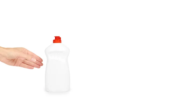 Afwassen wasmiddel dispenser fles in hand geïsoleerd op een witte achtergrond. Huishoudelijk werk en sanitaire concept. kopiëren van ruimte, sjabloon — Stockfoto