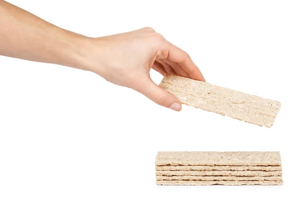 Dieet droog brood stokken in de hand. Geïsoleerd op een witte achtergrond. Dieet en gezondheid van voedsel en snack — Stockfoto