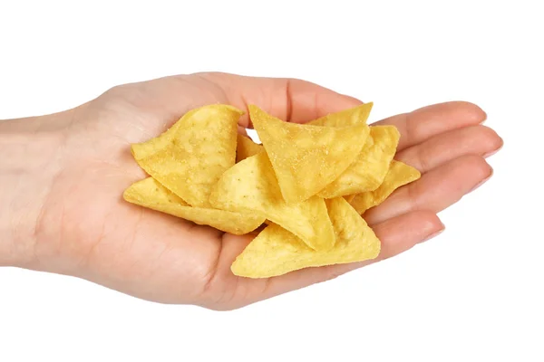 Patatas de maíz, nachos triangulares en la mano. Aislado sobre fondo blanco. Snack de comida rápida, tortilla mexicana —  Fotos de Stock