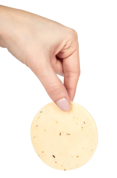 Queso redondo en rodajas con hierbas en la mano. Aislado sobre fondo blanco. Champiñones y ajo, albahaca y eneldo — Foto de Stock