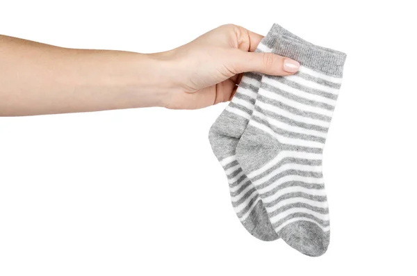 Chaussettes enfant en coton avec main, isolées sur fond blanc — Photo