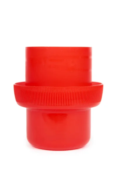 Вимірювальна чашка для рідкого миючого засобу, ізольована на білому тлі — стокове фото