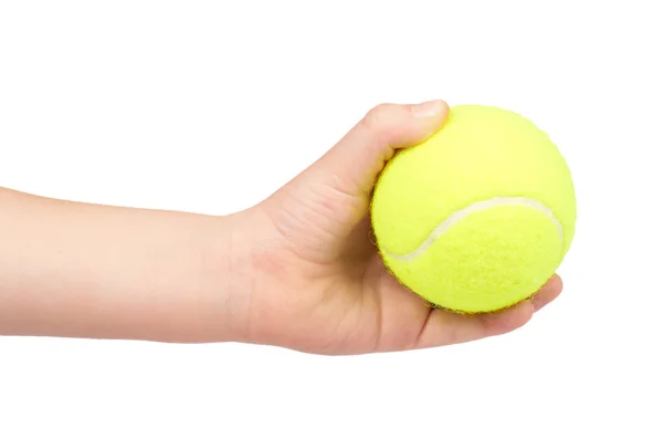 Kind hält Tennisball in der Hand, isoliert auf weißem Hintergrund — Stockfoto