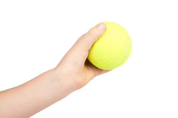 Kind hält Tennisball in der Hand, isoliert auf weißem Hintergrund — Stockfoto