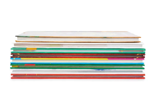 Forskellige farverige bøger i stak isoleret på hvid baggrund - Stock-foto