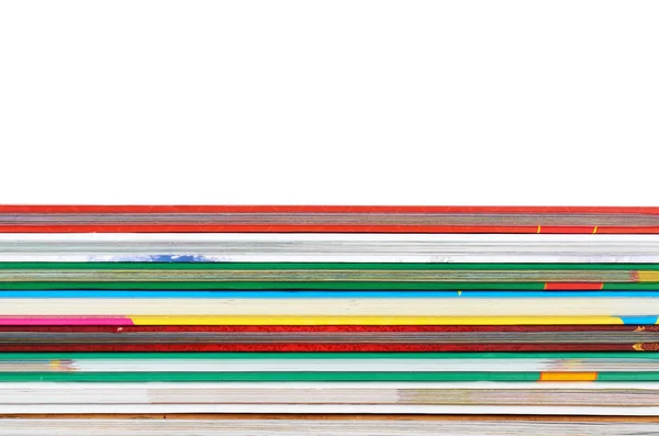 Diferentes libros coloridos en pila aislados sobre fondo blanco, espacio de copia — Foto de Stock