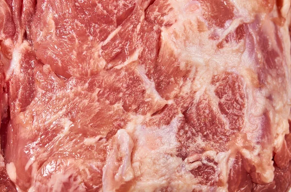 Rohes frisches Schweinefleisch aus nächster Nähe Hintergrund — Stockfoto