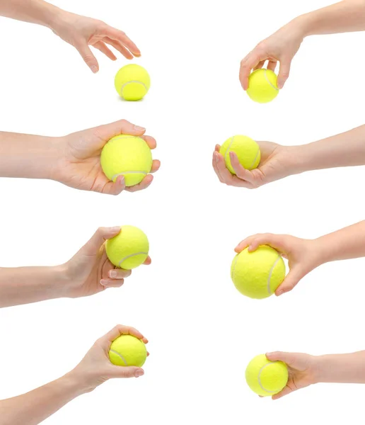 Satz verschiedener Tennisbälle mit isolierter Hand auf weißem Hintergrund — Stockfoto