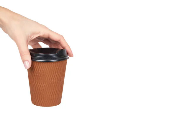 Take out coffee in thermo cup with hand. Isolated on a white background. Disposable container, hot beverage. copy space, template — Stock Photo, Image