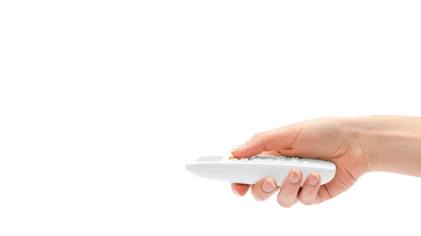 Main femme tenant la télécommande. Isolé sur fond blanc. espace de copie, modèle . — Photo
