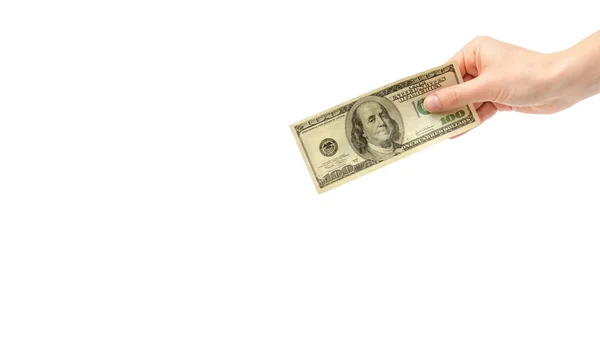 Female hand takes or gives one hundred US dollars. Isolated on white background. copy space, template. — Stock Photo, Image