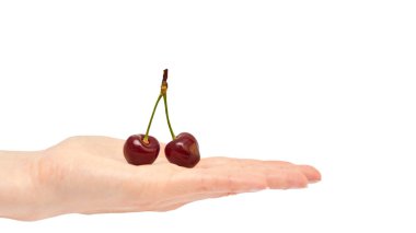 Güzel el kiraz jest tutar. Beyaz arka plan üzerinde izole. kopyalama alanı şablonu.