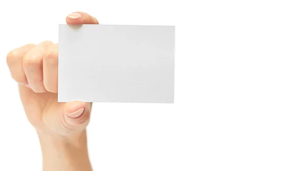 Las manos femeninas tienen una tarjeta de visita. Aislado sobre fondo blanco. copiar espacio, plantilla — Foto de Stock