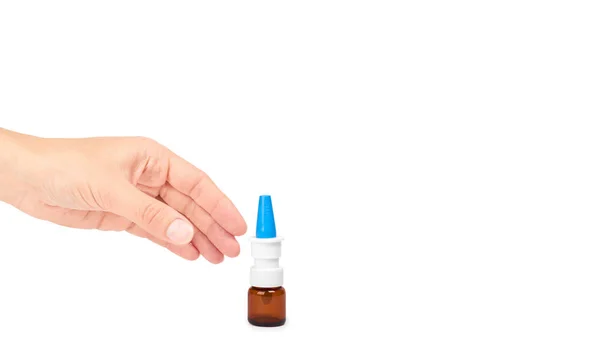 Botella de pulverización nasal de mano femenina. Aislado sobre fondo blanco. copiar espacio, plantilla —  Fotos de Stock
