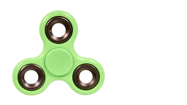 Fidget spinner verde aislado sobre fondo blanco. copiar espacio, plantilla — Foto de Stock