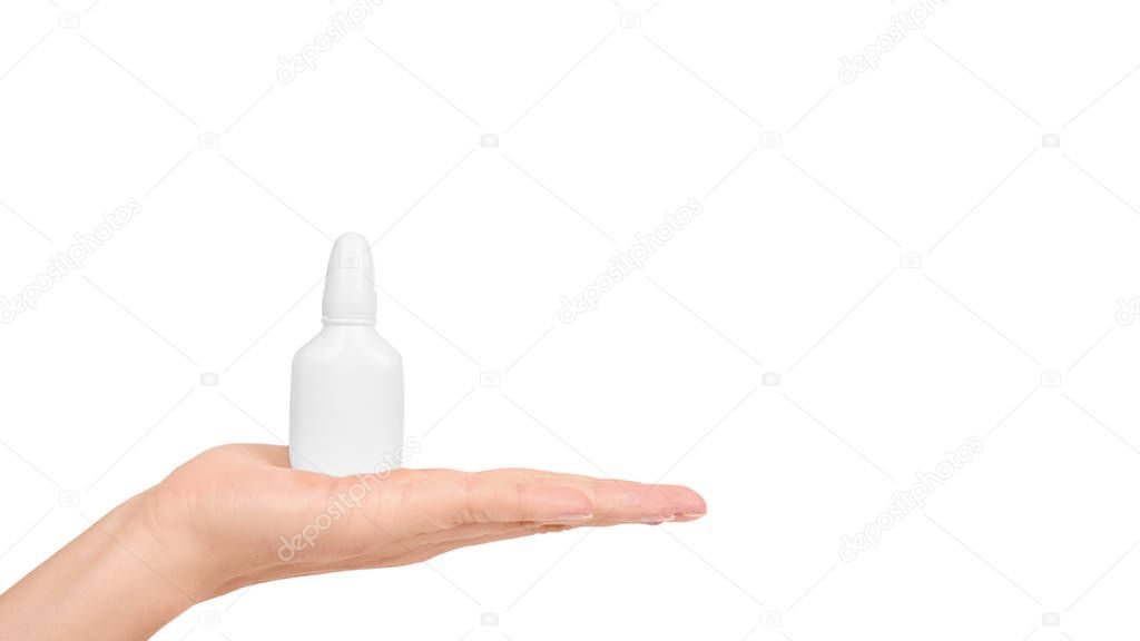 Medicine Dropper Bottle in hand Isolated on White Background. copy space, template