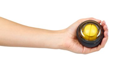 Sarı plastik jimnastik topu. Bilek için egzersiz aletleri. Spor aracı.