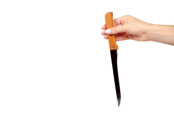 Ręka z nożem kuchennym, naczynia domowe, drewniana rączka. — Zdjęcie stockowe