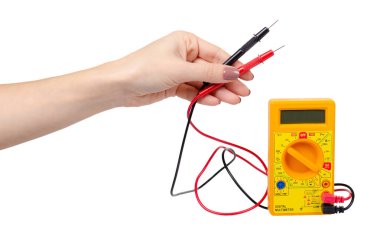 Sarı plastik çoklu metre, elektrikli test aleti. Beyazda izole edilmiş.