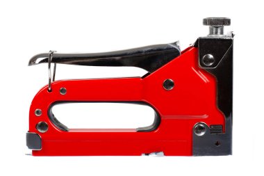 Kızıl endüstriyel zımba, mobilya endüstrisi donanımı. Beyazda izole edilmiş.