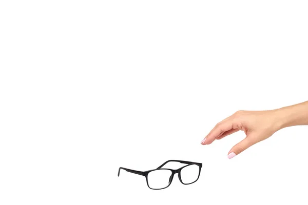 손과 블랙 안경, 눈 광학 보정 도구. — 스톡 사진