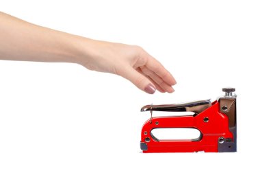 Kızıl endüstriyel zımba, mobilya endüstrisi donanımı. Beyazda izole edilmiş.