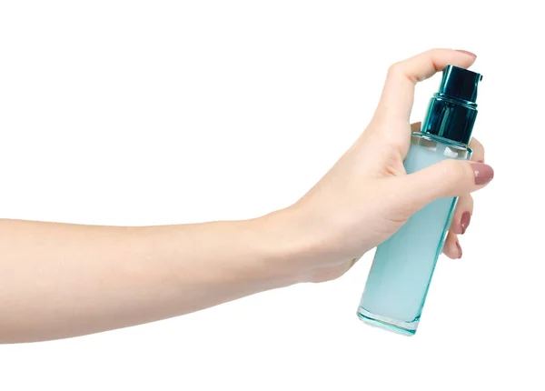 Arckrém üvegpalackban adagolóval. Kék tartály. — Stock Fotó