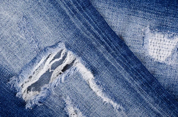 Niebieskie dżinsy bawełniane tekstury tło z miejsca na ksero. — Zdjęcie stockowe