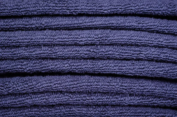 Textura tkaniny z modrých ručníků, horní pohled fotografie. — Stock fotografie