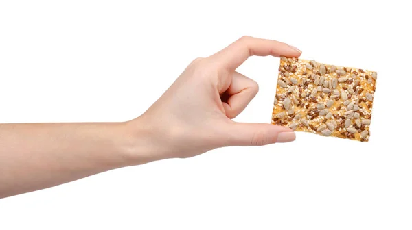 Mano Con Galleta Rectángulo Con Semillas Diferentes Aislado Sobre Fondo —  Fotos de Stock