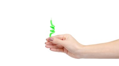 Hand with birthday cake candle, party decoration, fun and happy. Isolated on white background. Copy space, template.