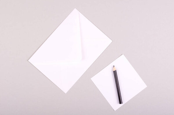 Pencil and letter with envelope, writing mail.