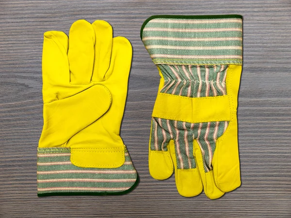 Guantes de trabajo de cuero amarillo — Foto de Stock