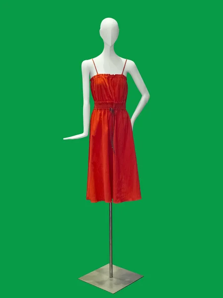 Kvinnlig skyltdocka iklädd röd klänning. — Stockfoto