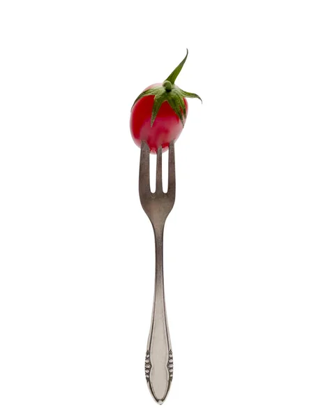 Cherry tomato on a fork. — Stock Photo, Image