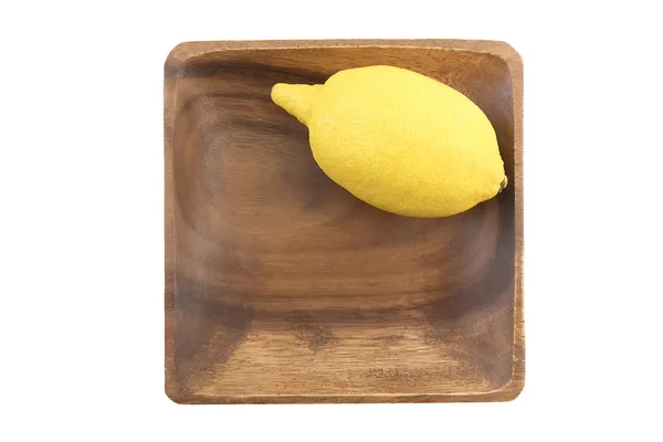 Tahta bir kasede limon. — Stok fotoğraf