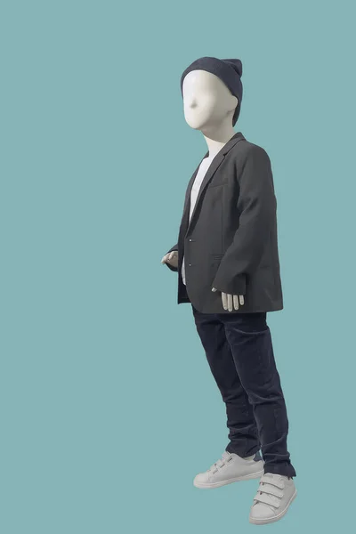 Full-length Child Mannequin Dressed In Fashionable Kids Wear