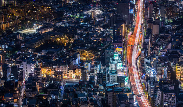 aerial view of Tokyo city with modern architecture at nighttime, travel concept 