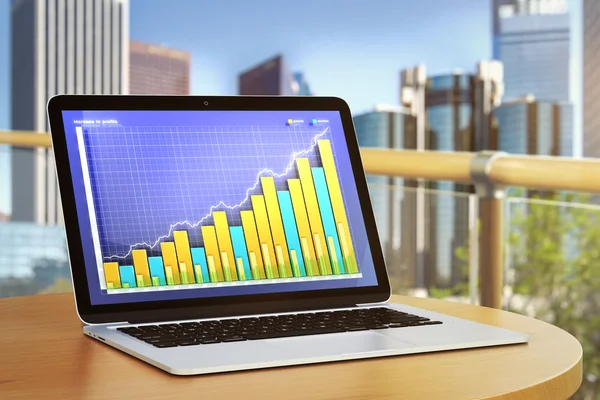 Laptop con business chart — Foto Stock