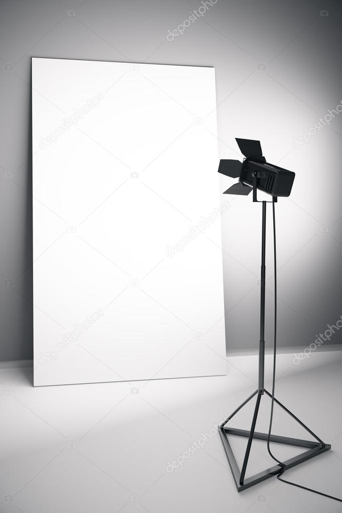 Blank white poster with professional lighting