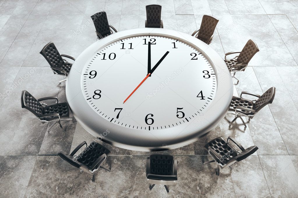 Big clock conference table Stock Photo by ©peshkov 125679364
